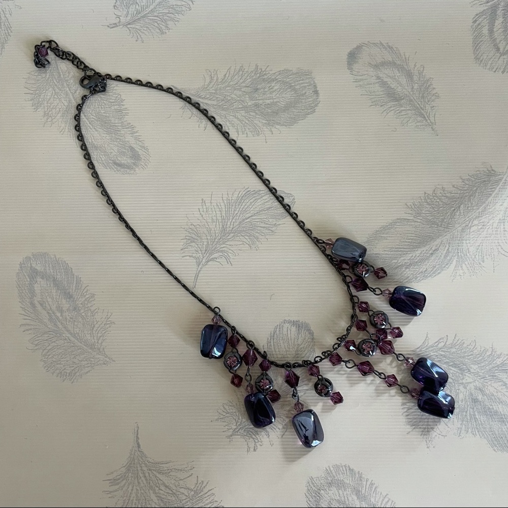 Brass necklace with purple and black stones